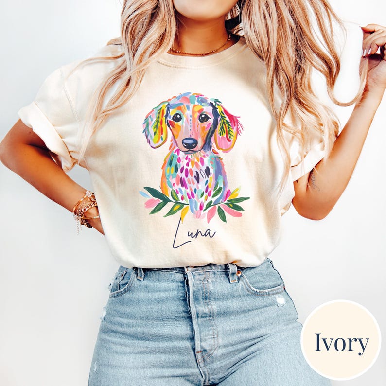 Colorful watercolor dachshund shirt with personalized dog name “Luna” on ivory Comfort Colors tee, cute boho dog lover graphic tee, pastel doxie pet portrait shirt for women.