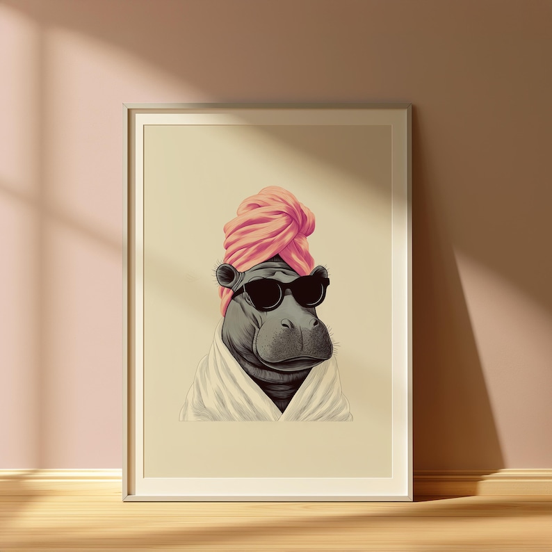 May include: Framed art print featuring a stylized hippo wearing sunglasses, a pink turban, and a white robe. The hippo is depicted in a relaxed pose, suggesting a spa or relaxation theme. The artwork is set against a neutral background.