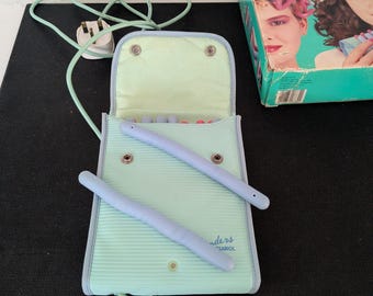 Rizadores vintage de Clairol, circa 1985, en funcionamiento.