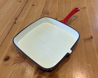 Plancha cuadrada de hierro fundido roja y blanca