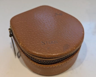 Estuche de cuero vintage de los años 30 con gemelos.