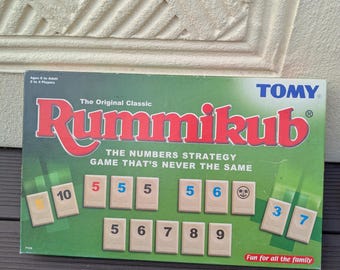 Vintage Rummikub board games circa: 1990s. Complete with instructions.