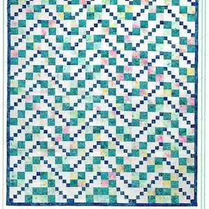 May include: A quilt titled "Rock the Boat" with a repeating zigzag pattern in shades of teal, white, and navy blue. The quilt measures 74" x 86". The design is by Curlicue Creations.