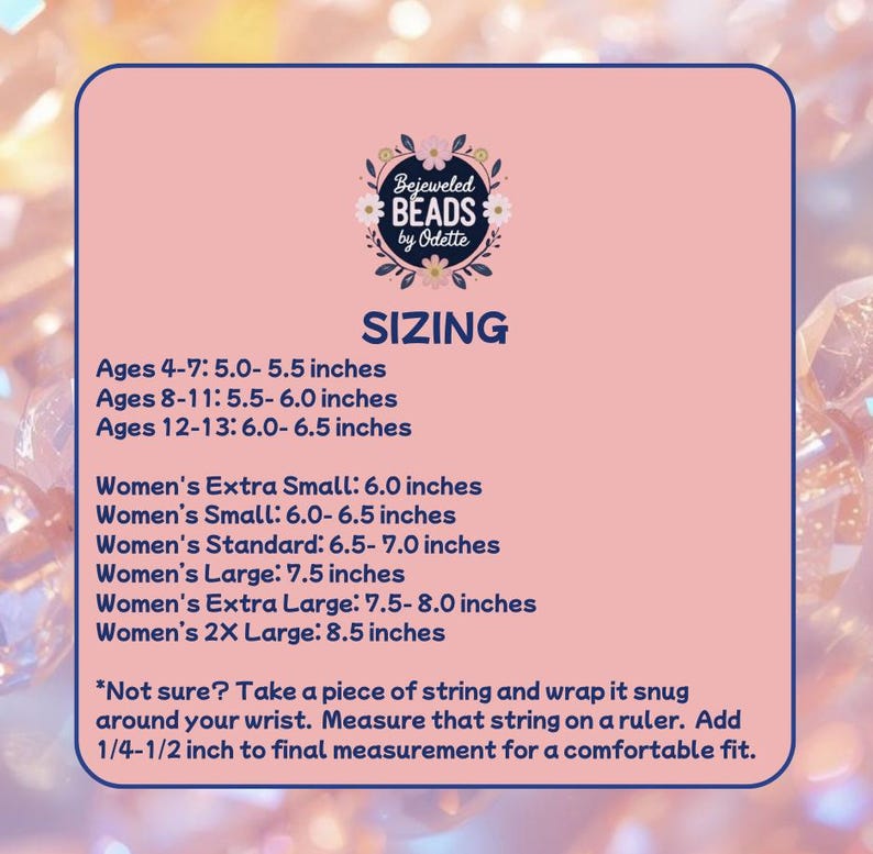 May include: A pink rectangular sizing chart with dark blue text. The logo Bejeweled BEADS by Odette is at the top. It lists wrist measurements in inches for ages 4-13 and sizes from Extra Small to 2X Large, plus instructions for measuring with string.