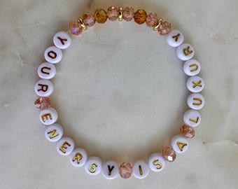 Your Energy Is a Luxury Bracelet Inspired by The Life of a Showgirl: Glass Crystal Beads and 14K Gold-Plated Hearts - Customize your colors