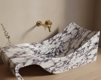Lavabo de baño con ondas esculturales de mármol Calacatta Viola, encimera de lavabo