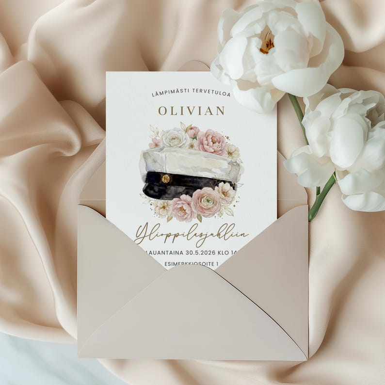 May include: A graduation announcement card with a watercolor illustration of a student cap and floral arrangement. The card is inside a light pink envelope, with white flowers in the background. The text on the card reads "Olivian" and "Ylioppilasjuhliin".