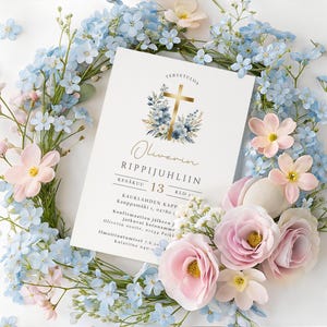 May include: A white invitation card with gold cross and floral design, surrounded by light blue and pink flowers. The card has text in Finnish, including the name "Oliverin" and the date "13".