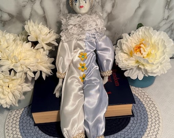 Vintage Porcelain Pierrot Clown Doll with Satin Costume and Floral Accents