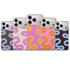 May include: Five smartphone cases arranged in a row, each featuring a clear camera cutout and a distinct color combination of wavy, abstract lines. The designs include brown with lavender, cream with pink, pink with orange, and brown with light blue.