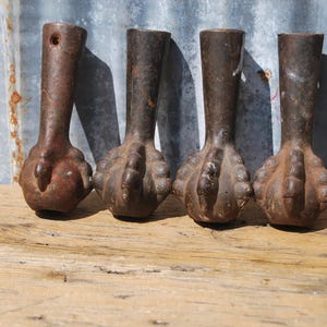 Set of Four Antique Cast Iron Claw Ball Legs