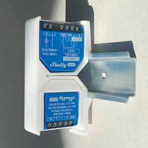 Shelly double holder for DIN rail – includes 2x adapters for Shelly Mini. Flame-retardant, self-extinguishing, UL 94 V-0 certified.
