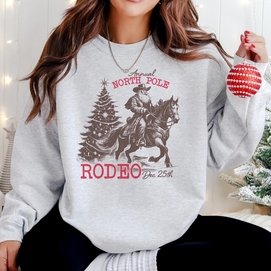 North Pole Rodeo Christmas Sweatshirt: Western Santa Pullover - Etsy