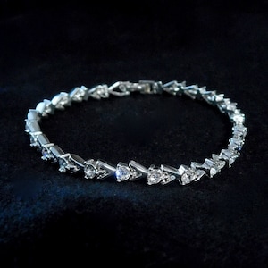 Avon Dazzling Rhinestone Tennis Bracelet - Small, NIB ~~ Clear Crystals, Silvertone