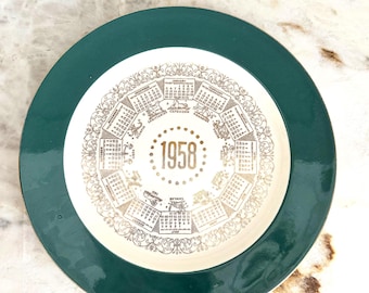 Calendario antiguo de 1958 con placa del zodíaco
