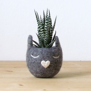 lovely kitty head, pictured in medium grey color with a heart-shaped nose made with soft wool felt