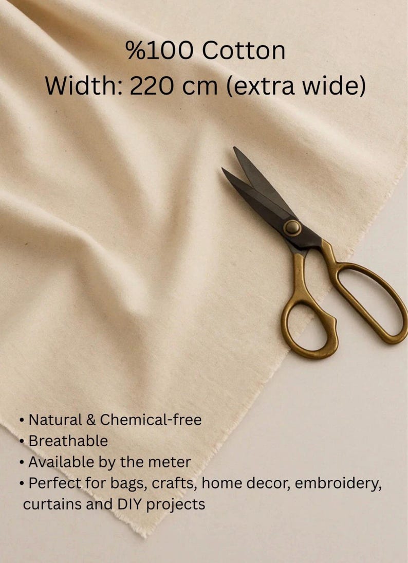 May include: Cream-colored cotton fabric with text: "%100 Cotton, Width: 220 cm (extra wide)". Features include "Natural & Chemical-free" and "Breathable". A pair of scissors with gold handles and black blades rests on the fabric.