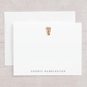 May include: White stationery set featuring a watercolor illustration of a coffee cup with a pink bow. The set includes a folded card and an envelope. The name "SOPHIE HARRINGTON" is printed in black at the bottom of the card.