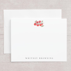 May include: White stationery set featuring a blank card and envelope. The card has a watercolor illustration of red tomatoes with green leaves in the upper right corner. The name "WHITNEY BROWNING" is printed in a serif font at the bottom.