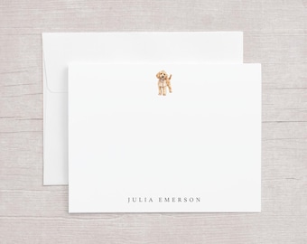May include: A white stationery set featuring a watercolor illustration of a golden doodle puppy. The set includes a folded card and an envelope. The name "JULIA EMERSON" is printed in black at the bottom of the card.