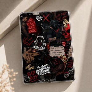 May include: A clear tablet case featuring a collage design with a biker theme. The design includes images of a skull, a biker, and text that reads "No Rules Just Ride", "Live Fast Die Last", and "Good girls love reading dirty books".