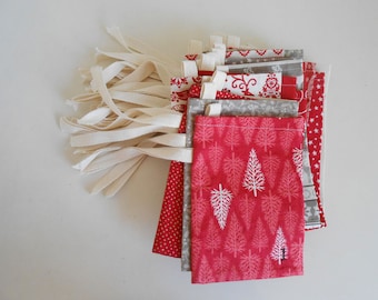Calendario de Adviento de tela escandinava, rojo y blanco, 25 bolsas navideñas