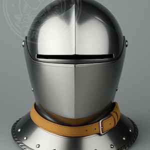 May include: A polished silver knight's helmet with a visor and a leather neck strap. The helmet has a rounded top with a pointed finial. The neck guard is secured with rivets and a tan leather strap with a buckle.