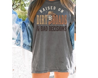 Raised On Dirt Roads-shirt, western grafisch T-shirt vrouwen, shirt cowgirl schedel, outfit countryconcert, zuidelijk lifestyle-T-shirt