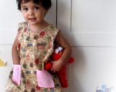 Girl pinafore, fun little village girl apron, toddler vest. Sizes from 6 months to 4 years.