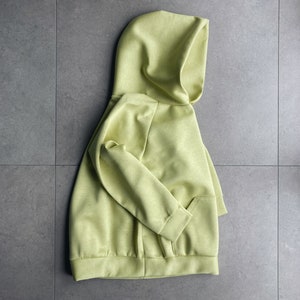Side. Oversize hoodie. Without logos. Color citric yellow