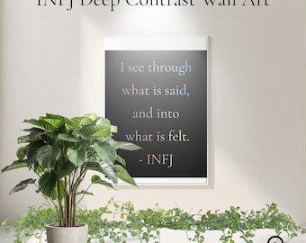 May include: A framed wall art print with the text "I see through what is said, and into what is felt. - INFJ". The artwork is displayed above a potted plant and trailing greenery. The title "INFJ Deep Contrast Wall Art" is at the top.