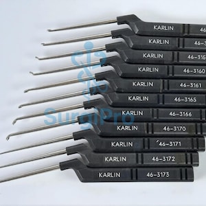 May include: A set of ten surgical instruments with black handles and silver metal tips. Each handle is labeled with the brand "KARLIN" and a unique product number, such as "46-3151". The tools are arranged in a neat, organized stack.