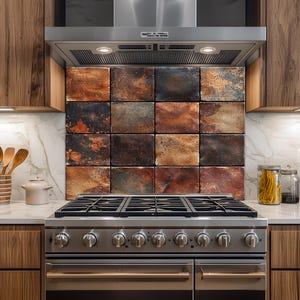 May include: A kitchen backsplash composed of sixteen rectangular tiles with a rustic, weathered appearance. The tiles feature a blend of earthy tones, including shades of brown, orange, and hints of blue and black. The tiles are installed above a stainless steel gas range.