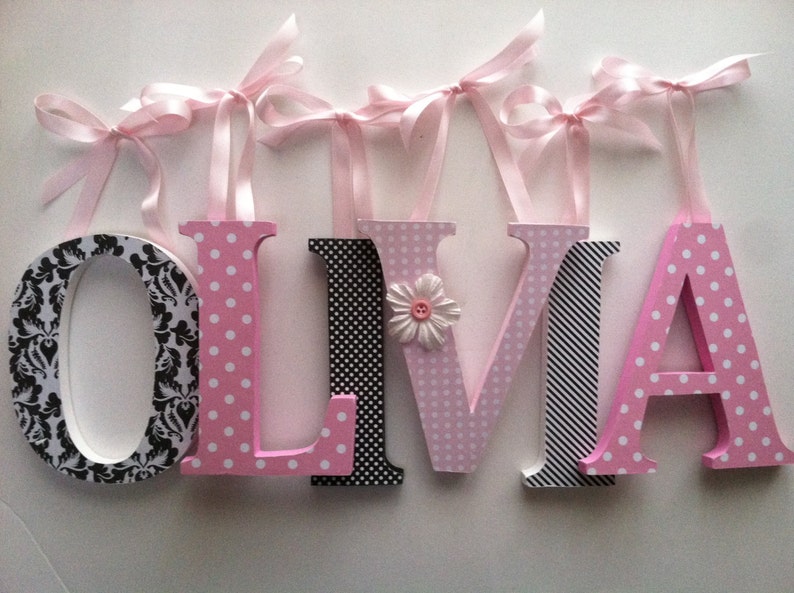 Wooden letters for nursery in pink and black. Etsy