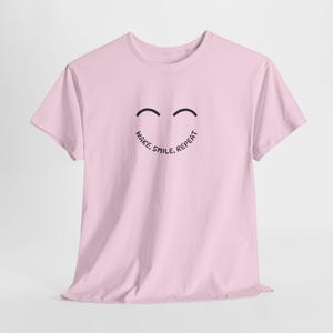 Wake Smile Repeat T-Shirt, Positive Quote Tee, Unisex Graphic Shirt, Inspirational Gift, Motivational Casual Wear Light Pink
