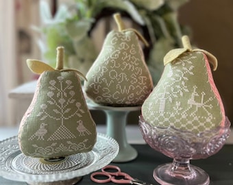 NEW! ANNiE BeEZ FOLK ArT Spring Green Pears NW-111 counted cross stitch patterns at cottageneedle.com 2024 Nashville Market