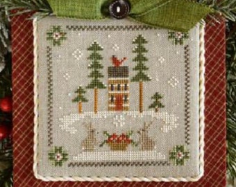 New! LITTLE HOUSE NEEDLEWORKS Log Cabin Bunnies No. 2 Log Cabin Christmas series counted cross stitch patterns at thecottageneedle.com