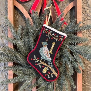 New ANNIE BeEZ FOLK ArT 12 Days of Christmas Stockings counted cross stitch patterns at cottageneedle.com 2024 Nashville Market image 3