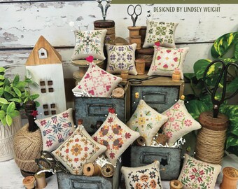 New! PRIMROSE COTTAGE 12 Monthly Minis counted cross stitch patterns at thecottageneedle.com