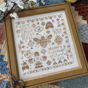 PANSY PATCH Honey Bee Sampler counted cross stitch patterns at cottageneedle.com 2025 Nashville Market
