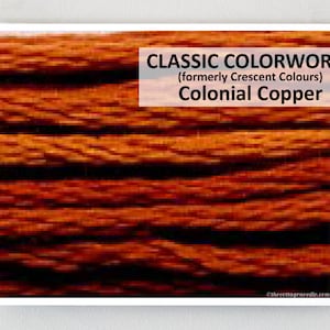 May include: Close-up of a textured, woven fabric in shades of orange, red, and brown. The fabric is labeled "CLASSIC COLORWORKS (formerly Crescent Colours) Colonial Copper."
