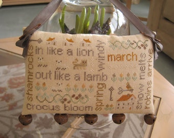 WITH THY NEEDLE March Word Play Optional Rusty Jingle Bells doorbells counted cross stitch patterns at cottageneedle.com Irish shamrock
