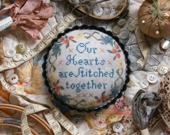 HEARTSTRING SAMPLERY Stitched Together counted cross stitch patterns at thecottageneedle.com