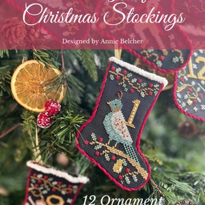 New ANNIE BeEZ FOLK ArT 12 Days of Christmas Stockings counted cross stitch patterns at cottageneedle.com 2024 Nashville Market image 2