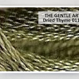 May include: A close-up of a textured, abstract image in shades of green and brown. The image is titled "THE GENTLE ART Dried Thyme 0110".