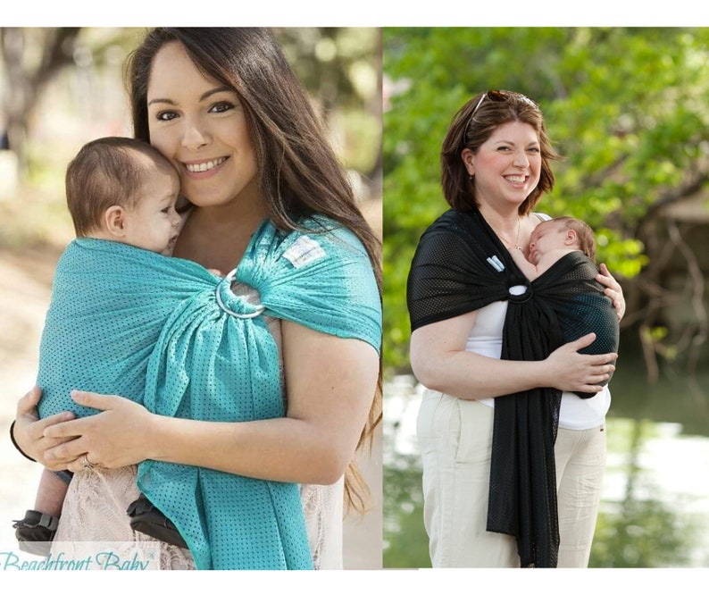 Puede incluir: Se muestran dos portabeb&eacute;s. Uno es turquesa con un patr&oacute;n de puntos, el otro negro. Ambos tienen un anillo met&aacute;lico y est&aacute;n dise&ntilde;ados para llevar a un beb&eacute;. El texto "Beachfront Baby" es visible en la parte inferior.