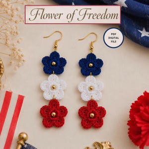 May include: A pair of dangle earrings featuring three stacked crocheted flowers in blue, white, and red, each with a small gold-tone bead center. The text "Flower of Freedom" and "PDF DIGITAL FILE" are visible in the image.