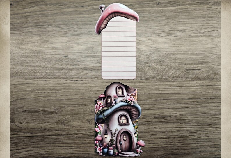 Tall floral mushroom cottage hidden note with the lined insert removed and displayed above the house design on a wooden background.