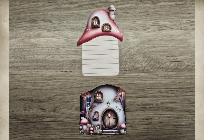 Pink mushroom cottage hidden note with the lined insert removed and displayed above the matching house design on a wooden background.
