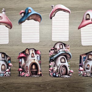 Mushroom cottage hidden notes shown with their pull-out lined inserts above the matching house designs, displayed on a wood background for junk journal crafting.